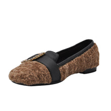 Ballerina in pelliccia e fibbia