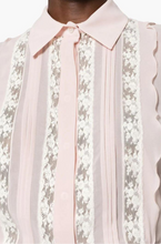 Blusa Smanicata